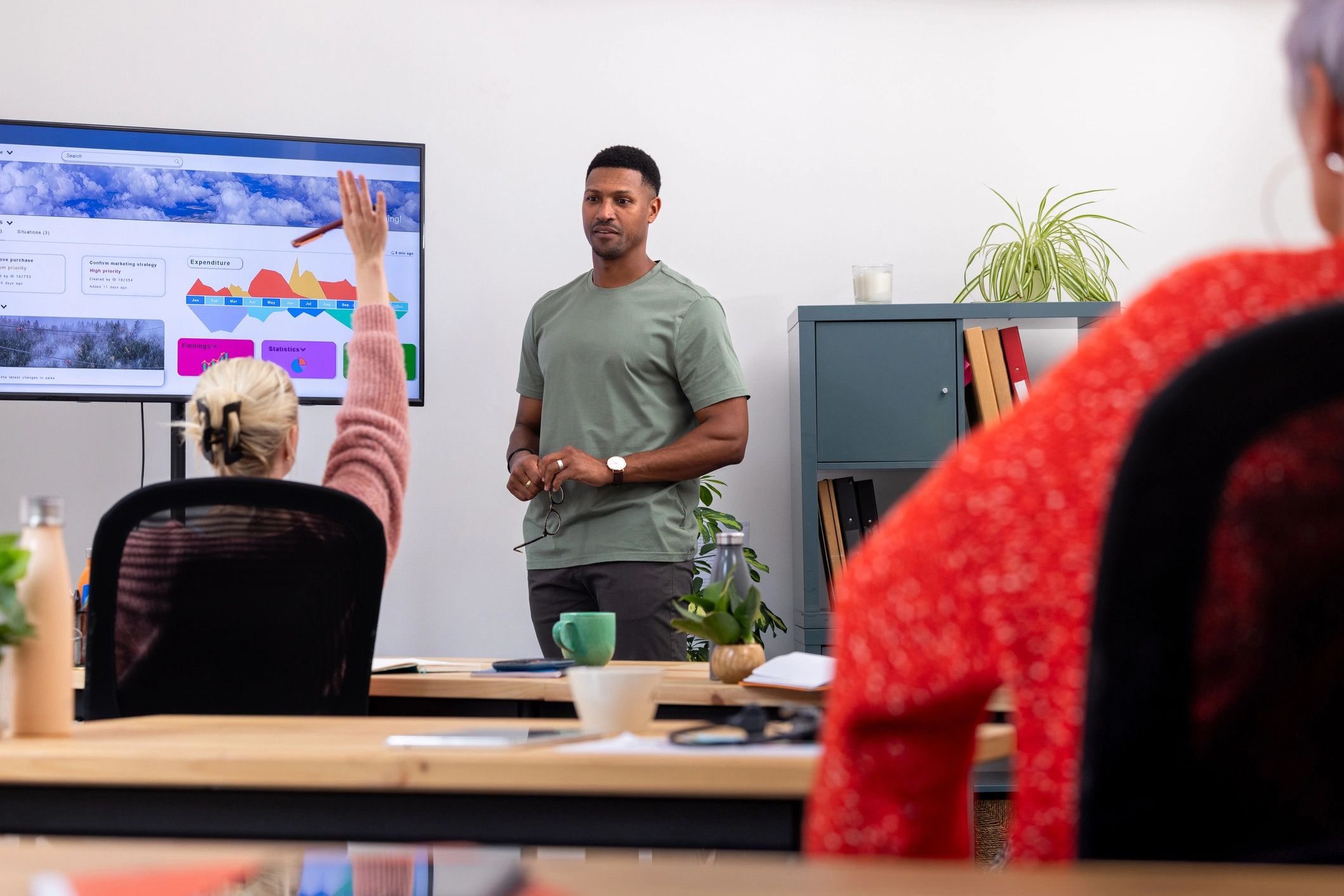 Professional team collaborating in a modern office meeting